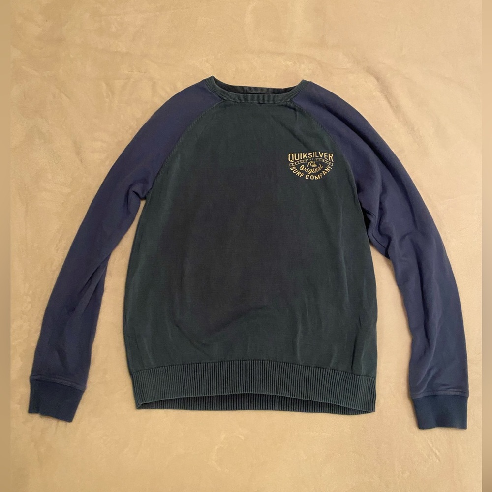 Quicksilver sweater size medium. Like new. No stains